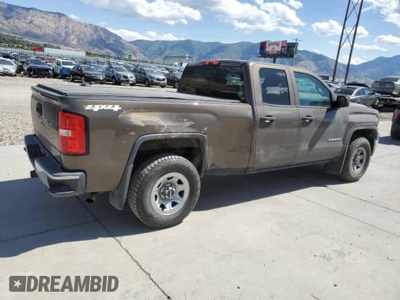 2014 GMC Sierra 1500 with VIN 1GTV2TEH3EZ197846, listed as a Copart auction lot 80380395 with 105,114 mi miles and Salvage title. Bid and sale history available at DreamBid. Image 3.