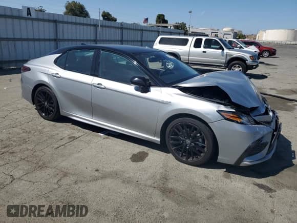 2021 Toyota Camry Hybrid XSE with VIN 4T1K31AK3MU021277, listed as a Copart auction lot 70713925 with 110,295 mi miles and Salvage title. Bid and sale history available at DreamBid. Image 4.
