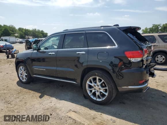2014 Jeep Grand Cherokee Summit with VIN 1C4RJFJT4EC508994, listed as a Copart auction lot 66526655 with 107,657 mi miles and Salvage title. Bid and sale history available at DreamBid. Image 2.