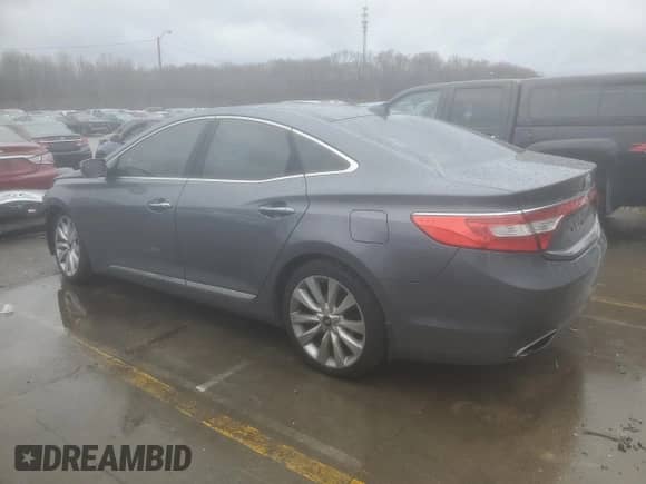 2013 Hyundai Azera с VIN KMHFH4JG0DA323501, выставлен на аукционе Copart как лот 84069634 с пробегом 96 296 миль миль и Списание • Salvage title. История ставок и продаж доступна на DreamBid. Изображение 2.
