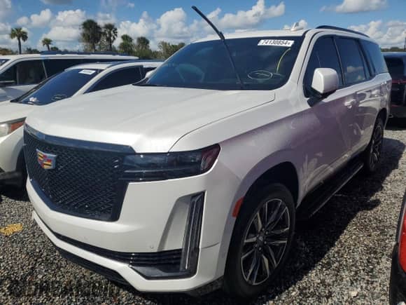 2021 Cadillac Escalade Sport with VIN 1GYS3EKL1MR270077, listed as a Copart auction lot 74130854 with 21,584 mi miles and Salvage title. Bid and sale history available at DreamBid. Image 1.