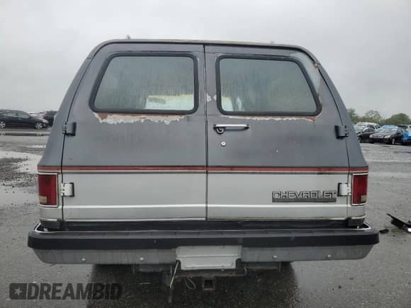 1990 Chevrolet Suburban с VIN 1GNER16K4LF118555, выставлен на аукционе Copart как лот 58189665 с пробегом 77 432 миль миль и Чистый • Clean title. История ставок и продаж доступна на DreamBid. Изображение 6.