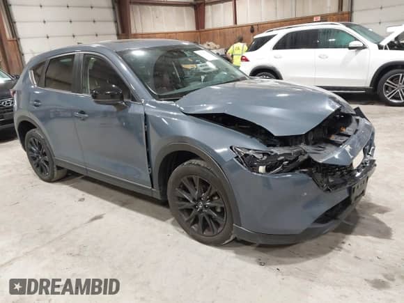 2022 Mazda CX-5 S Preferred z VIN JM3KFBCM1N0551165, wystawiony jako IAAI lot #42277023 z przebiegiem 34 115 mil mil oraz . Historia ofert i sprzedaży dostępna na DreamBid. Obrazek 1.