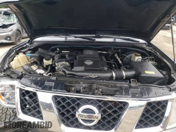 2006 Nissan Pathfinder LE z VIN 5N1AR18W06C672863, wystawiony jako Copart lot #69017065 z przebiegiem 168 298 mil mil oraz Nie do naprawy • Non repairable. Historia ofert i sprzedaży dostępna na DreamBid. Obrazek 12.