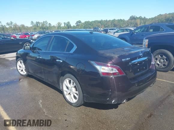 2012 Nissan Maxima S z VIN 1N4AA5AP4CC805938, wystawiony jako IAAI lot #43423540 z przebiegiem 182 388 mil mil oraz . Historia ofert i sprzedaży dostępna na DreamBid. Obrazek 3.