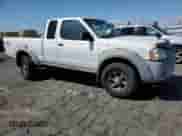 2002 Nissan Frontier XE with VIN 1N6ED26T52C304849, listed as a Copart auction lot 81852985 with 184,485 mi miles and Salvage title. Bid and sale history available at DreamBid. Image 4.