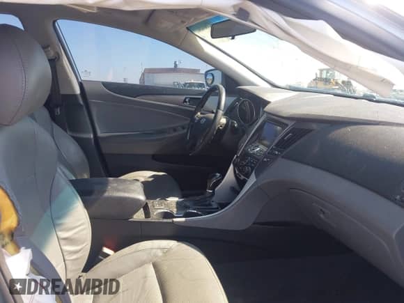 2011 Hyundai Sonata Hybrid with VIN KMHEC4A42BA015551, listed as a IAAI auction lot 42664847 with 165,102 mi miles and . Bid and sale history available at DreamBid. Image 5.