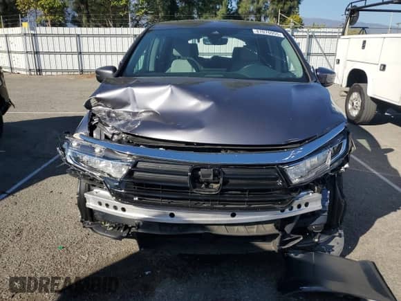 2024 Honda Odyssey EX-L with VIN 5FNRL6H64RB069069, listed as a Copart auction lot 87076955 with 15,204 mi miles and Salvage title. Bid and sale history available at DreamBid. Image 5.