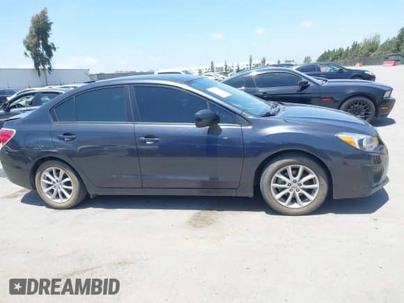 2013 Subaru Impreza Premium with VIN JF1GJAB62DH031508, listed as a IAAI auction lot 42348961 with 153,574 mi miles and . Bid and sale history available at DreamBid. Image 13.