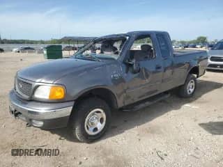 2004 Ford F-150 XL with VIN 2FTRX18W04CA88421, listed as a Copart auction lot 66944135 with Not provided miles and Salvage title. Bid and sale history available at DreamBid. Image 1.