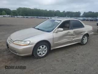 2002 Honda Accord EX with VIN JHMCG660X2C002471, listed as a Copart auction lot 57236995 with 299,618 mi miles and Salvage title. Bid and sale history available at DreamBid. Image 1.