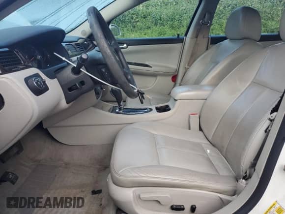 2016 Chevrolet Impala LTZ with VIN 2G1WC5E3XG1120770, listed as a Copart auction lot 71266205 with 212,008 mi miles and Clean title. Bid and sale history available at DreamBid. Image 7.