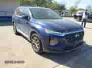 2020 Hyundai Santa Fe SE with VIN 5NMS23AD0LH141404, listed as a IAAI auction lot 41870350 with 144,109 mi miles and . Bid and sale history available at DreamBid. Image 1.
