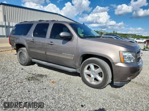 2014 Chevrolet Suburban LT с VIN 1GNSCJE03ER197724, выставлен на аукционе Copart как лот 62272145 с пробегом 136 667 миль миль и Списание • Salvage title. История ставок и продаж доступна на DreamBid. Изображение 4.