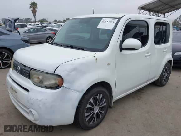 2012 Nissan Cube SL с VIN JN8AZ2KR5CT254201, выставлен на аукционе IAAI как лот 42143061 с пробегом 186 435 миль миль и . История ставок и продаж доступна на DreamBid. Изображение 2.