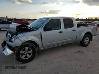 2009 Nissan Frontier SE with VIN 1N6AD09W29C400098, listed as a Copart auction lot 82475364 with 100,442 mi miles and Salvage title. Bid and sale history available at DreamBid. Image 1.