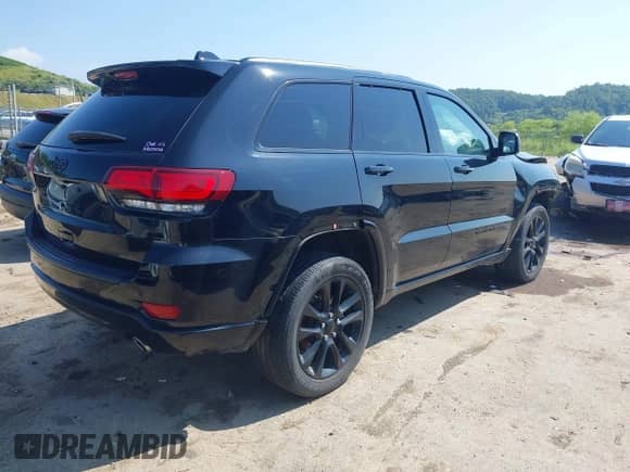 2021 Jeep Grand Cherokee Laredo E z VIN 1C4RJFAGXMC824014, wystawiony jako IAAI lot #42569558 z przebiegiem 52 810 mil mil oraz . Historia ofert i sprzedaży dostępna na DreamBid. Obrazek 4.
