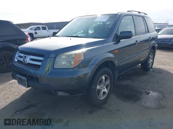 2006 Honda Pilot EX-L with VIN 5FNYF28796B026606, listed as a IAAI auction lot 41612560 with 224,577 mi miles and . Bid and sale history available at DreamBid. Image 17.