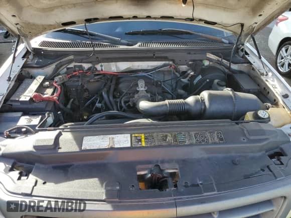 2004 Ford F-150 XL z VIN 2FTRX17224CA52275, wystawiony jako Copart lot #80212264 z przebiegiem Nie podano mil oraz Szkoda całkowita • Salvage title. Historia ofert i sprzedaży dostępna na DreamBid. Obrazek 11.