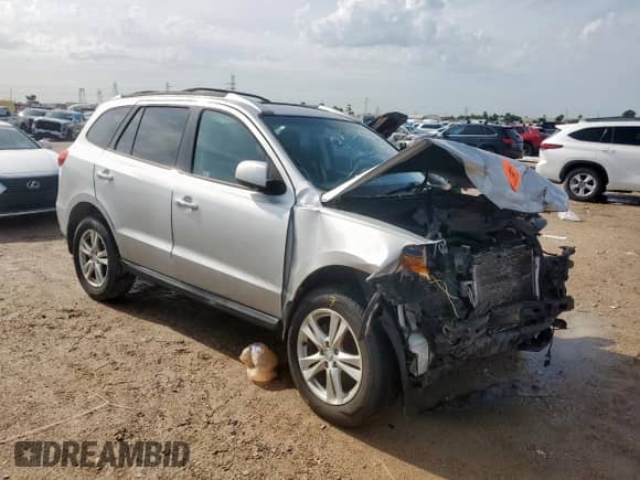 2012 Hyundai Santa Fe Limited с VIN 5XYZK4AG6CG158412, выставлен на аукционе Copart как лот 60856275 с пробегом 85 394 миль миль и Списание • Salvage title. История ставок и продаж доступна на DreamBid. Изображение 4.