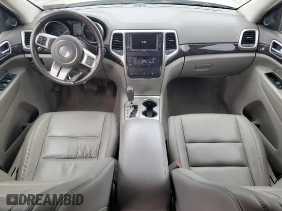 2012 Jeep Grand Cherokee Laredo z VIN 1C4RJFAG0CC156397, wystawiony jako Copart lot #87400775 z przebiegiem 165 192 mil mil oraz Szkoda całkowita • Salvage title. Historia ofert i sprzedaży dostępna na DreamBid. Obrazek 8.