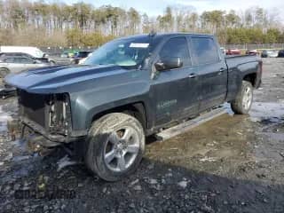 2018 Chevrolet Silverado 1500 LT with VIN 1GCUKREC4JF128159, listed as a Copart auction lot 44807225 with 89,885 mi miles and Salvage title. Bid and sale history available at DreamBid. Image 1.