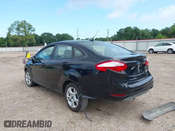 2015 Ford Fiesta SE with VIN 3FADP4BJ1FM138426, listed as a IAAI auction lot 42494295 with 111,827 mi miles and . Bid and sale history available at DreamBid. Image 3.
