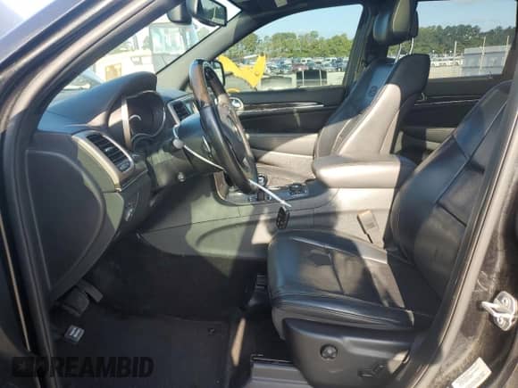 2015 Jeep Grand Cherokee Overland z VIN 1C4RJFCGXFC741716, wystawiony jako Copart lot #81087425 z przebiegiem 170 445 mil mil oraz Szkoda całkowita • Salvage title. Historia ofert i sprzedaży dostępna na DreamBid. Obrazek 7.