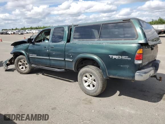 2001 Toyota Tundra Limited z VIN 5TBBT481X1S139032, wystawiony jako Copart lot #56427375 z przebiegiem 326 746 mil mil oraz Szkoda całkowita • Salvage title. Historia ofert i sprzedaży dostępna na DreamBid. Obrazek 2.