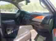 2009 Chevrolet Suburban LTZ z VIN 1GNFK36359R219818, wystawiony jako IAAI lot #42120323 z przebiegiem 146 999 mil mil oraz . Historia ofert i sprzedaży dostępna na DreamBid. Obrazek 5.