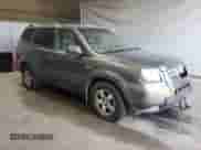 2006 Honda Pilot EX-L with VIN 2HKYF18796H514224, listed as a Copart auction lot 66299415 with 201,782 mi miles and Salvage title. Bid and sale history available at DreamBid. Image 4.