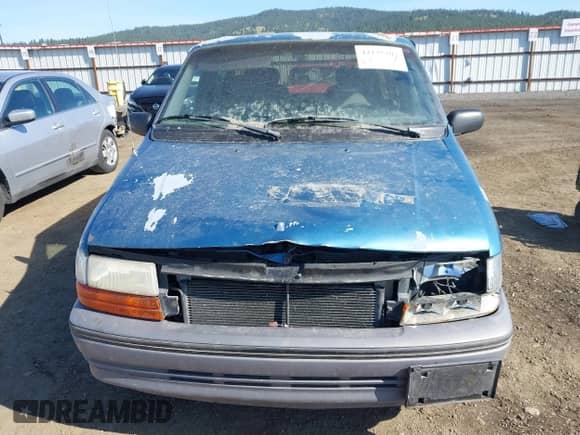 1993 Dodge Grand Caravan with VIN 1B4GH54R3PX606744, listed as a IAAI auction lot 42135204 with 159,517 mi miles and . Bid and sale history available at DreamBid. Image 11.