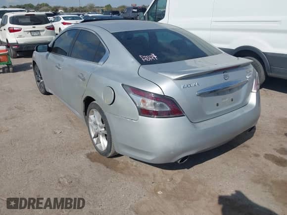 2014 Nissan Maxima S z VIN 1N4AA5AP4EC472126, wystawiony jako IAAI lot #43543829 z przebiegiem 137 050 mil mil oraz . Historia ofert i sprzedaży dostępna na DreamBid. Obrazek 3.