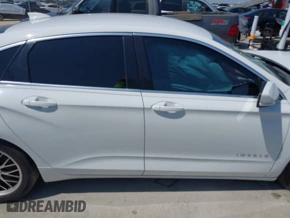 2015 Chevrolet Impala LT z VIN 1G1115SL4FU143467, wystawiony jako IAAI lot #43182559 z przebiegiem 131 015 mil mil oraz . Historia ofert i sprzedaży dostępna na DreamBid. Obrazek 13.
