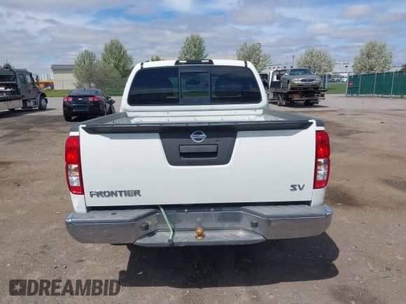 2014 Nissan Frontier Desert Runner z VIN 1N6AD0ER2EN748921, wystawiony jako IAAI lot #42143050 z przebiegiem 110 948 mil mil oraz . Historia ofert i sprzedaży dostępna na DreamBid. Obrazek 17.