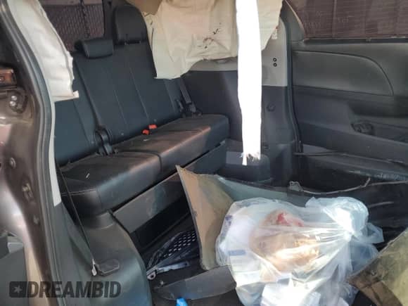 2015 Toyota Sienna SE with VIN 5TDXK3DC5FS642718, listed as a Copart auction lot 57339825 with 66,969 mi miles and Salvage title. Bid and sale history available at DreamBid. Image 11.