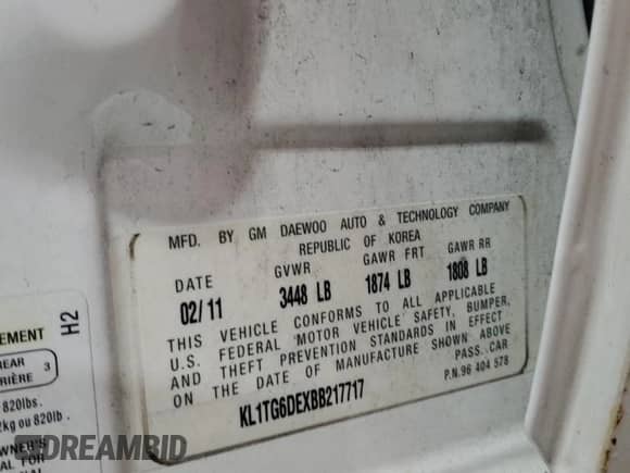 2011 Chevrolet Aveo 2LT z VIN KL1TG6DEXBB217717, wystawiony jako Copart lot #64679725 z przebiegiem 169 372 mil mil oraz Szkoda całkowita • Salvage title. Historia ofert i sprzedaży dostępna na DreamBid. Obrazek 13.