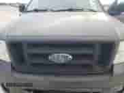 2006 Ford F-150 STX with VIN 1FTRX02W26KB22442, listed as a Copart auction lot 48959125 with 238,690 mi miles and Salvage title. Bid and sale history available at DreamBid. Image 11.