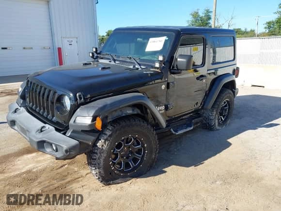 2019 Jeep Wrangler Sport S with VIN 1C4GJXAG9KW583300, listed as a IAAI auction lot 43061781 with 55,543 mi miles and . Bid and sale history available at DreamBid. Image 2.