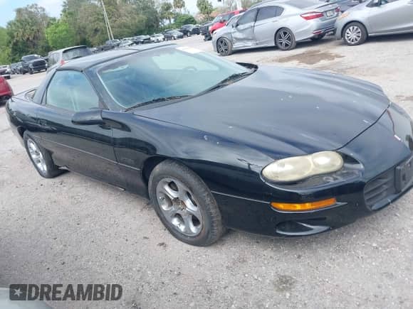 1998 Chevrolet Camaro Z28 z VIN 2G1FP22G2W2131930, wystawiony jako IAAI lot #41588098 z przebiegiem 24 866 mil mil oraz . Historia ofert i sprzedaży dostępna na DreamBid. Obrazek 1.