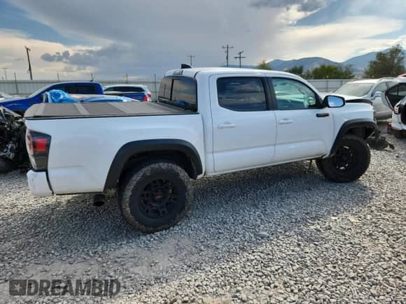 2020 Toyota Tacoma SR5 с VIN 5TFCZ5AN2LX236218, выставлен на аукционе Copart как лот 71645715 с пробегом 69 727 миль миль и Списание • Salvage title. История ставок и продаж доступна на DreamBid. Изображение 3.
