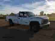 1991 Chevrolet Silverado 2500 z VIN 1GCGC24K3ME185408, wystawiony jako Copart lot #84802895 z przebiegiem 198 684 mil mil oraz Szkoda całkowita • Salvage title. Historia ofert i sprzedaży dostępna na DreamBid. Obrazek 13.