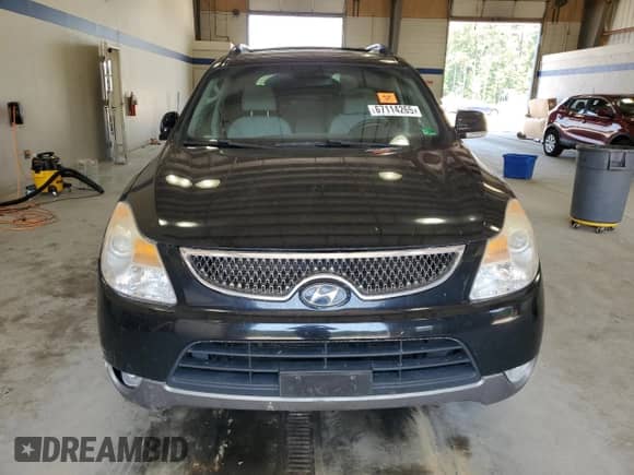2010 Hyundai Veracruz Limited с VIN KM8NUDCC8AU122103, выставлен на аукционе Copart как лот 67114265 с пробегом 325 044 миль миль и Списание • Salvage title. История ставок и продаж доступна на DreamBid. Изображение 5.