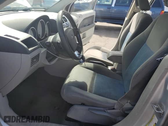 2007 Dodge Caliber SXT z VIN 1B3HB48B07D315802, wystawiony jako Copart lot #81734655 z przebiegiem 174 760 mil mil oraz Szkoda całkowita • Salvage title. Historia ofert i sprzedaży dostępna na DreamBid. Obrazek 7.