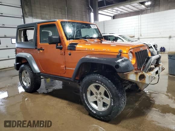 2011 Jeep Wrangler Rubicon with VIN 1J4BA6D11BL573772, listed as a Copart auction lot 70234365 with 118,181 mi miles and Clean title. Bid and sale history available at DreamBid. Image 4.