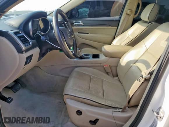 2017 Jeep Grand Cherokee Overland with VIN 1C4RJECG8HC965161, listed as a Copart auction lot 82068045 with 99,654 mi miles and Salvage title. Bid and sale history available at DreamBid. Image 7.