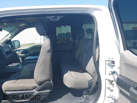 2018 Ford F-150 XL z VIN 1FTFX1E51JKE82628, wystawiony jako IAAI lot #43201475 z przebiegiem 79 461 mil mil oraz . Historia ofert i sprzedaży dostępna na DreamBid. Obrazek 8.