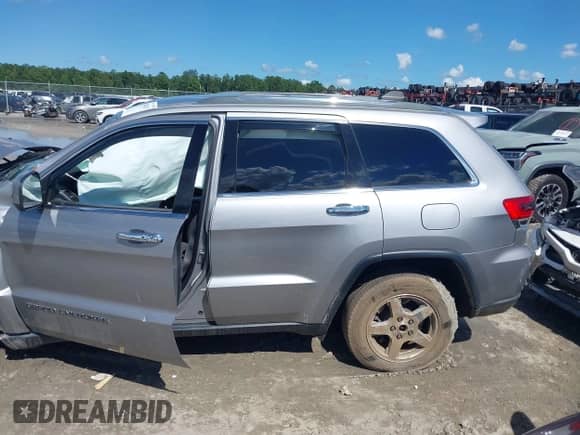 2019 Jeep Grand Cherokee Altitude with VIN 1C4RJEAG8KC811141, listed as a IAAI auction lot 42804337 with 119,686 mi miles and . Bid and sale history available at DreamBid. Image 14.