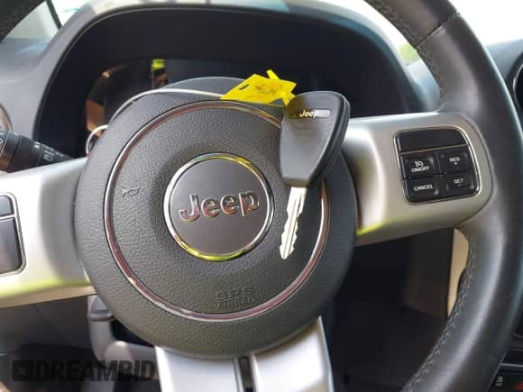 2015 Jeep Compass Latitude with VIN 1C4NJCEB5FD361630, listed as a IAAI auction lot 42263965 with 66,866 mi miles and . Bid and sale history available at DreamBid. Image 11.