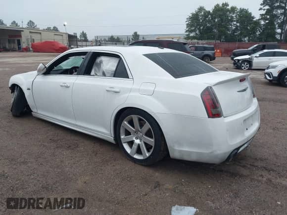 2014 Chrysler 300 SRT-8 с VIN 2C3CCAFJ6EH156853, выставлен на аукционе IAAI как лот 42370748 с пробегом 44 434 миль миль и . История ставок и продаж доступна на DreamBid. Изображение 3.